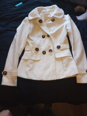 Chaqueta sobre rosa pequeña Foto 1 de 4