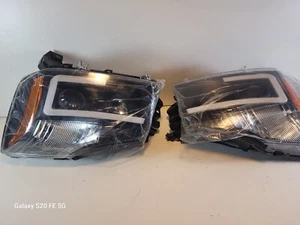 Nissan Headlights EE-DS567 HH3/H11, Both sides with bulbs and electroncis. - Picture 1 of 4