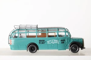 Roco 1:87 Saurer Komet Reisebus  Hoch Tief Bau AG Schwarz türkis (332011) A5951A - Bild 1 von 4