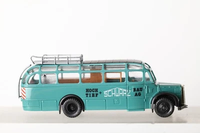 Roco 1:87 Saurer Komet Reisebus  Hoch Tief Bau AG Schwarz türkis (332011) A5951A - Bild 1 von 4