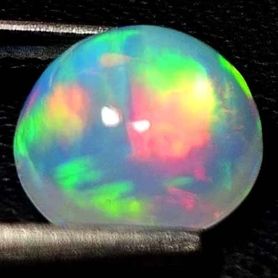 NATURAL AAA+VVS SUPERIOR COLOR PLAY ROUND CABOCHAN ETHIOPIAN WELO OPAL 1.50 CTS - Image 1 of 3