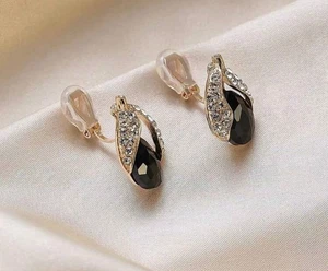 Clip on 1" gold, black and clear stone cutout teardrop earrings - Picture 1 of 4