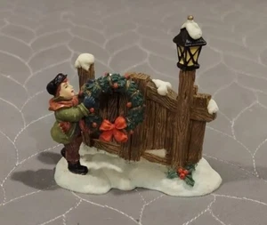 O'Well Boy Hanging Wreath on Fence Christmas Village People Accessory - Picture 1 of 5