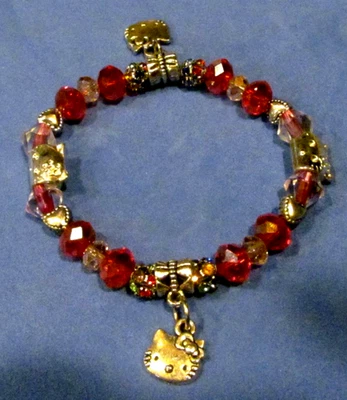 Pulsera Hello Kitty con Cristal Rojo y Rosa, Cuentas de Vidrio, Diseño Elástico Foto 1 de 4