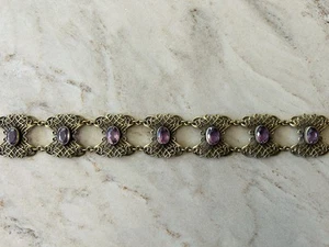 Antico girocollo in filigrana tono oro con cristalli viola intenso senza supporto 1900 circa - Foto 1 di 9