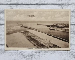 AK Warnemünde Trajetschiff ausfahrend Flugzeug Reise Ansichtskarte Postkarte alt - Picture 1 of 2
