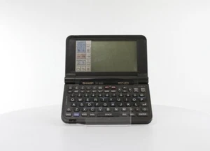 Planificateur de jour / fax organisateur de données vintage Sharp Wizard 512 Ko - très bon état (OZ-9520FX) - Photo 1 sur 6