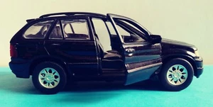 BMW x5 4.4i scala  1:36 modello da collezione di SMART TOYS, come nuovo,foto - Foto 1 di 6
