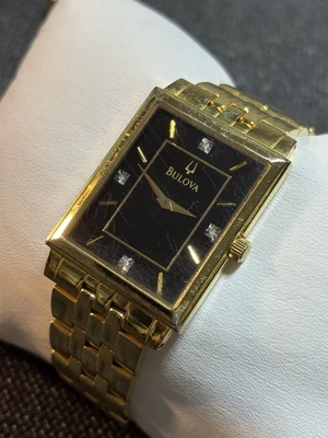 Reloj de vestir Bulova vintage rectangular tono dorado para hombre, B2,29 mm, funciona Foto 1 de 4