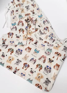 Juego de pijama Sleep Sense SM 2 PC cachorros y caras de perro feliz verano crm/pnk/azul - Imagen 1 de 11