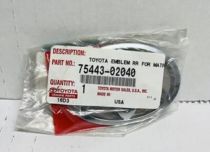 Genuine Toyota Emblem 75443-02040 MATRIX NEW OEM 2003-2008 - Picture 1 of 3