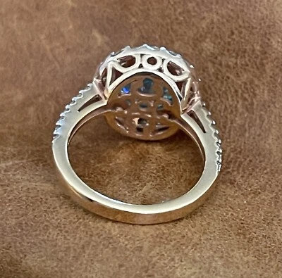 ELEGANTE ANILLO BBJ ORO ROSA SOBRE ESTERLINA 925 TOPACIO AZUL Y HALO CIRCONITA BLANCA TALLA 7 Foto 1 de 4