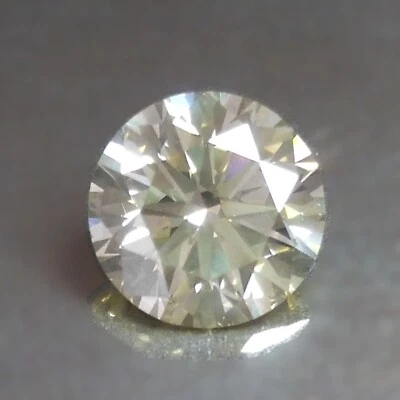 0.63cts 5.4mm VS2 Round Untreated Fancy Yellow Natural Earth Mined Loose Diamond - Image 1 of 2
