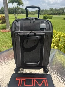 TUMI Merge 22" International schwarz Frontdeckel erweiterbar Allrad Handgepäck EUC - Bild 1 von 21