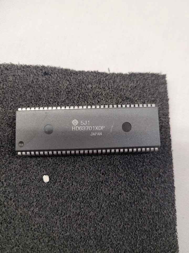 Hitachi HD63701X0P, 8-BIT Microcontroller, 4K x 8 EPROM, 64PDIP - Image 1 of 1