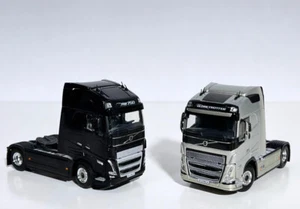 conjunto de 2 modelos de camionetas Volvo FH5 Globetrotter XL (negro y plata)... - Imagen 1 de 5