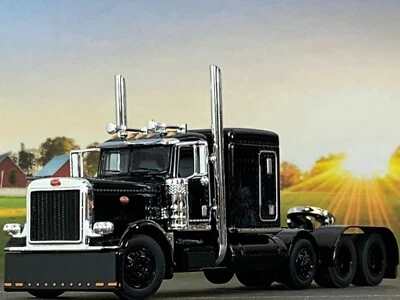 TRI EJE PETERBILT 389 NEGRO 1/64 DCP CON CAMA PLANA 63" Foto 1 de 4