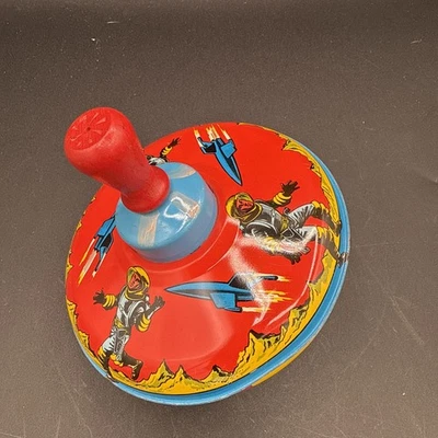 Litografía giratoria Buck Rogers 1965 vintage de colores brillantes madera roja Top Works Foto 1 de 4