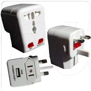 ADAPTADOR UNIVERSAL PARA ENCHUFES con CARGADOR USB USA UK EU AU - Imagen 1 de 3
