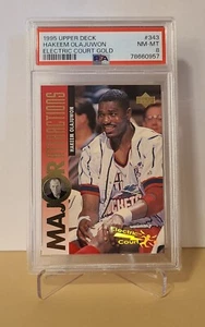 HAKEEM OLAJUWON - ELECTRIC COURT GOLD - 1995 CUBIERTA SUPERIOR - PSA 8 - Muy raro - Imagen 1 de 1