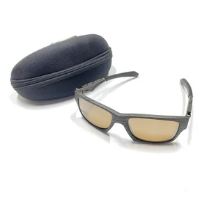 Occhiali da sole Oakley Jupiter quadrati polarizzati OO9135-07 venatura del legno/tungsteno iridio - Foto 1 di 11