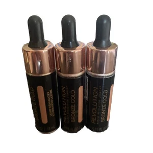 Pack of 3 Makeup Revolution Beauty Liquid Highlighter, Bronze Gold - Picture 1 of 3
