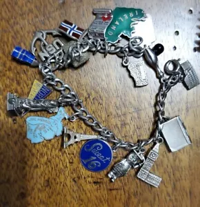 Bracciale multi ciondolo pesante in argento sterling - Foto 1 di 9