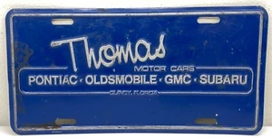 Vintage Thomas Motor Cars Pontiac Oldsmobile GMC Subaru License Plate Quincy FL - Picture 1 of 8