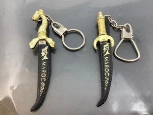 2 Vintage Souvenir SABERS Keyring MOROCCO Keychain MAROC Porte-Clés LONG KNIVES - Imagen 1 de 3