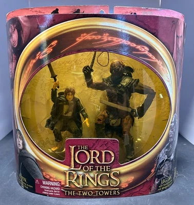 El Señor de los Anillos Las Dos Torres: 4" Pippin y 7" Ugluk Orc (Toy Biz, 2002) NRFB Foto 1 de 4