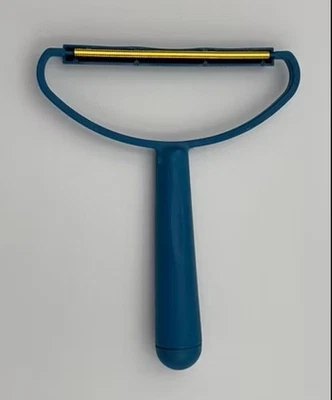 Cepillo de pelusa removedor de pelusa azul Foto 1 de 3