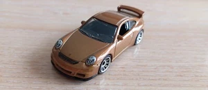 MATCHBOX - 2007 PORSCHE 911 GT3  BROWN        LOOSE 1/64 APROX *NEW* - Picture 1 of 7