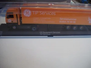 AWM MAN Kühlkoffer Sattelzug "GE Equipment Services TIP Service" in Vitrine 1:87 - Bild 1 von 4