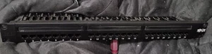 PANNEAU DE BRASSAGE TRIPP-LITE 24 PORTS CAT 6 neuf - Photo 1/2