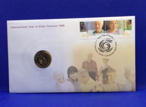 1999 INTERNATIONAL YEAR OF THE OLDER PERSONS $1 COIN PNC - Picture 1 of 2