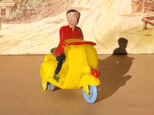 No tin toy (plastic) Grisoni-Italy Man On Yellow  Vespa Scooter very good. - Picture 1 of 11