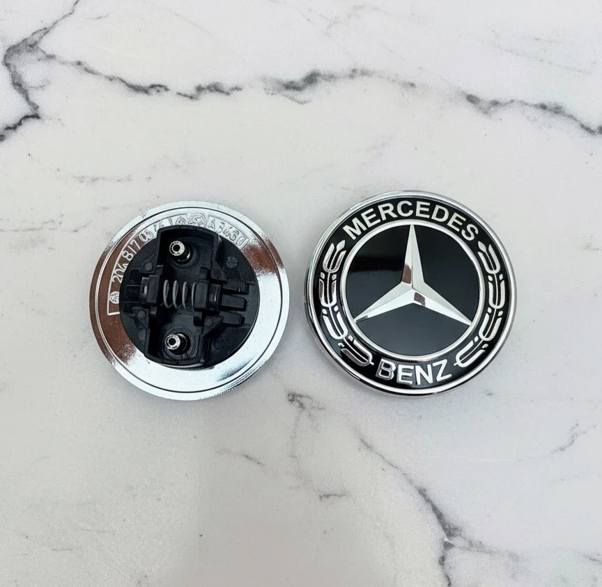 FRONT HOOD MERCEDES BENZ BLACK EMBLEM FLAT LAUREL WREATH BADGE 57MM AMG. - Image 1 of 1