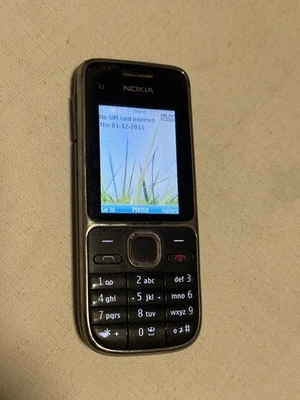 Discoloured Nokia C2-01 RM-721 Black Orange Network 64MB Mobile Phone - Image 1 of 4