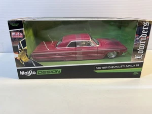 1964 Chevy Impala Lowrider New In The Box Diecast Model in 1/26 Scale by Maisto - Picture 1 of 7