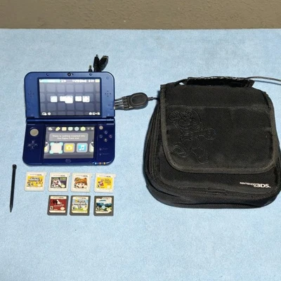 Nuevo Nintendo 3DS XL Galaxy Púrpura Usado + Juegos y Cargador + Estuche de Transporte Foto 1 de 4