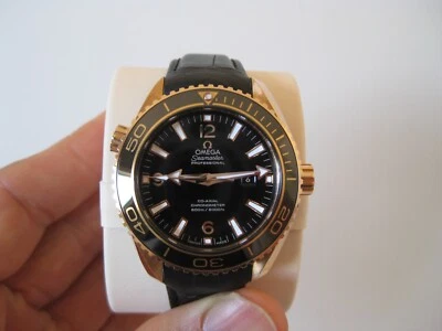 New Omega 18K Seamaster Planet Ocean Coaxial 600M Dive Watch 232.63.38.20.01.001 - Image 1 of 4