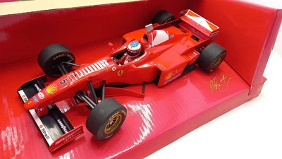 MIN510971805U7 Minichamps Ferrari F 310B 1997 M. Schumacher 1/18 - Immagine 1 di 4