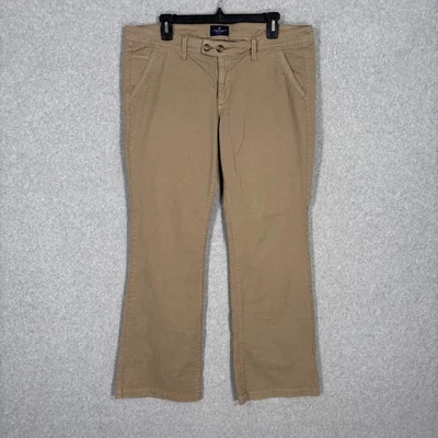 Pantalones chinos Y2K American Eagle tiro bajo corte bootcut caqui talla 14 kick boot elásticos Foto 1 de 4