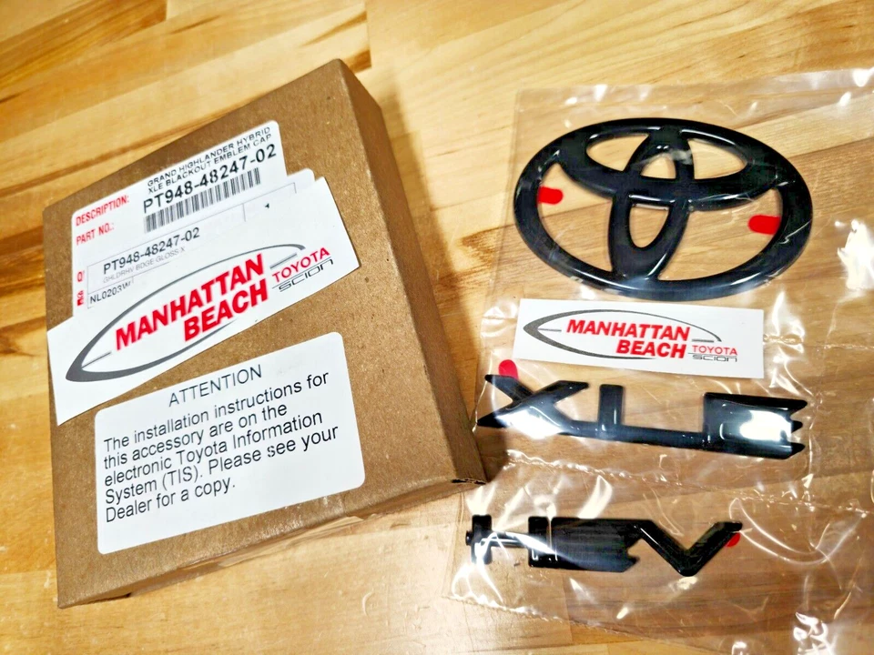 24-25 GRAND HIGHLANDER HYBRID XLE HEV BLACKOUT EMBLEMA SUPERPOSICIONES GENUINO TOYOTA Foto 1 de 1