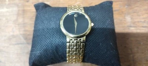 Precioso reloj museo Movado redondo esfera negra placa dorada 87 e4 9837 - Imagen 1 de 9