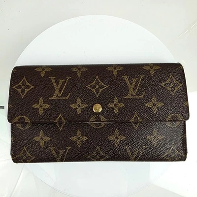 Bolso sin asas largo internacional de cuero de lona con monograma marrón LOUIS VUITTON Foto 1 de 4