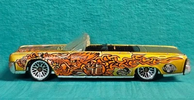 Coche fundido a presión Lincoln Continental Chocoen Gold 2003 Dragon Wagons Hot Wheels '64 2 Foto 1 de 4