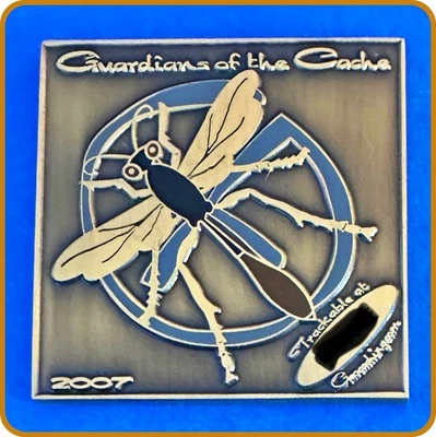Geocoin 2007 Wasp Guardians of the Cache Picture Puzzle Activated & Adoptable - Image 1 of 4