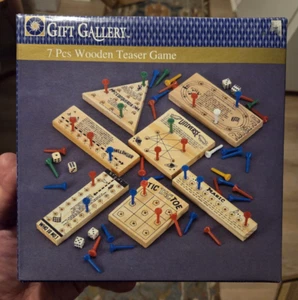 7 Pieces Wooden Teaser Games/Different Solid Wood Brain Teasers Never Used - Picture 1 of 7