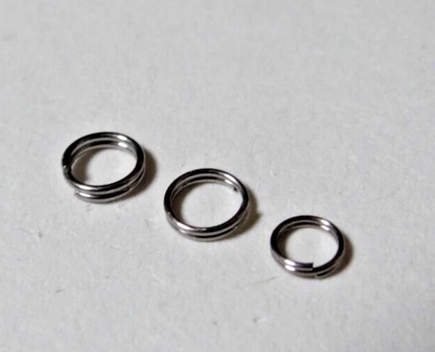 50 St. SPRENGRINGE EDELSTAHL ANGELN RINGE SPLIT RING SPRINGRINGE  5-6,5mm. - Bild 1 von 3